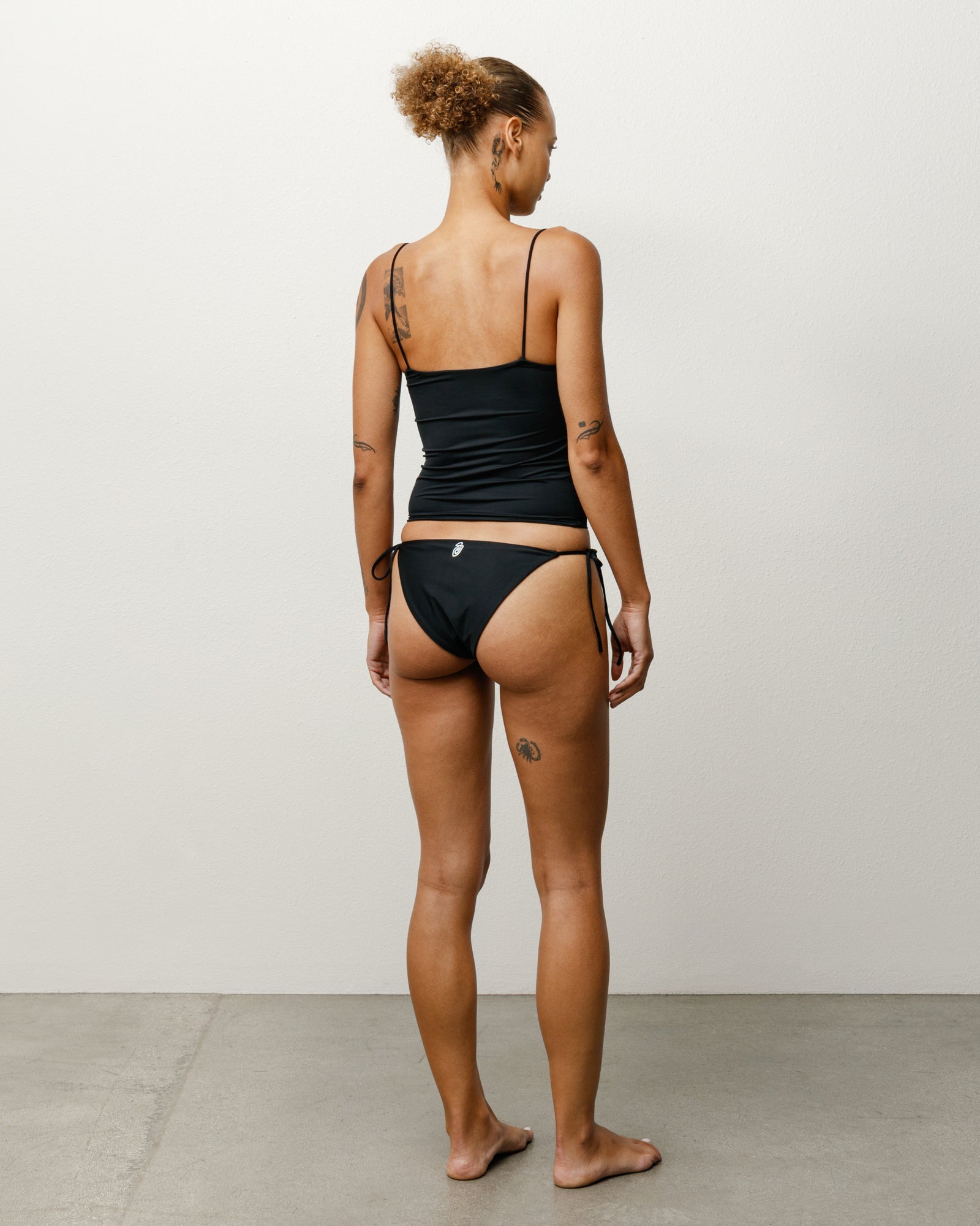 Side Tie Bikini Bottom Womens in the color Black