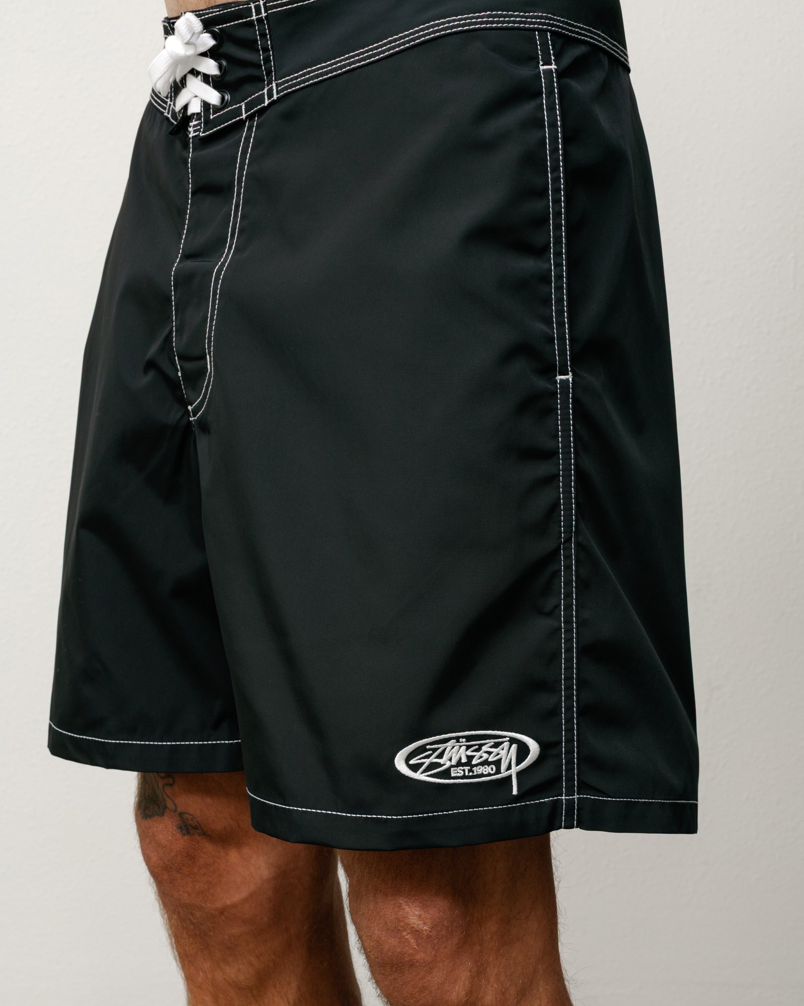 Coastal Board Short in Black with white contrast stitching, lace-up waist, Stüssy logo