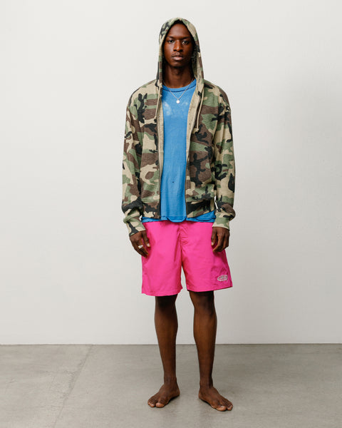 Coastal Board Short Unisex Trunk in Pink on Model, Drawcord Waist and Logo at Hem