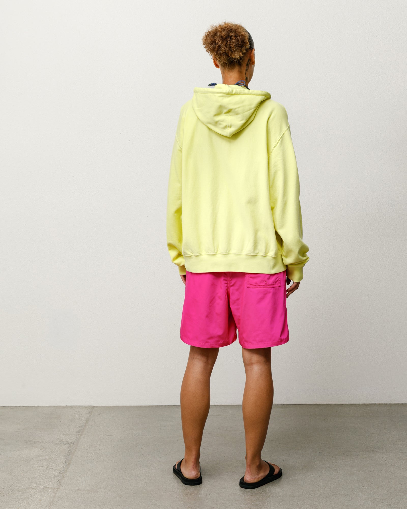 Coastal Board Short in Pink, on-model back view featuring rear patch pocket