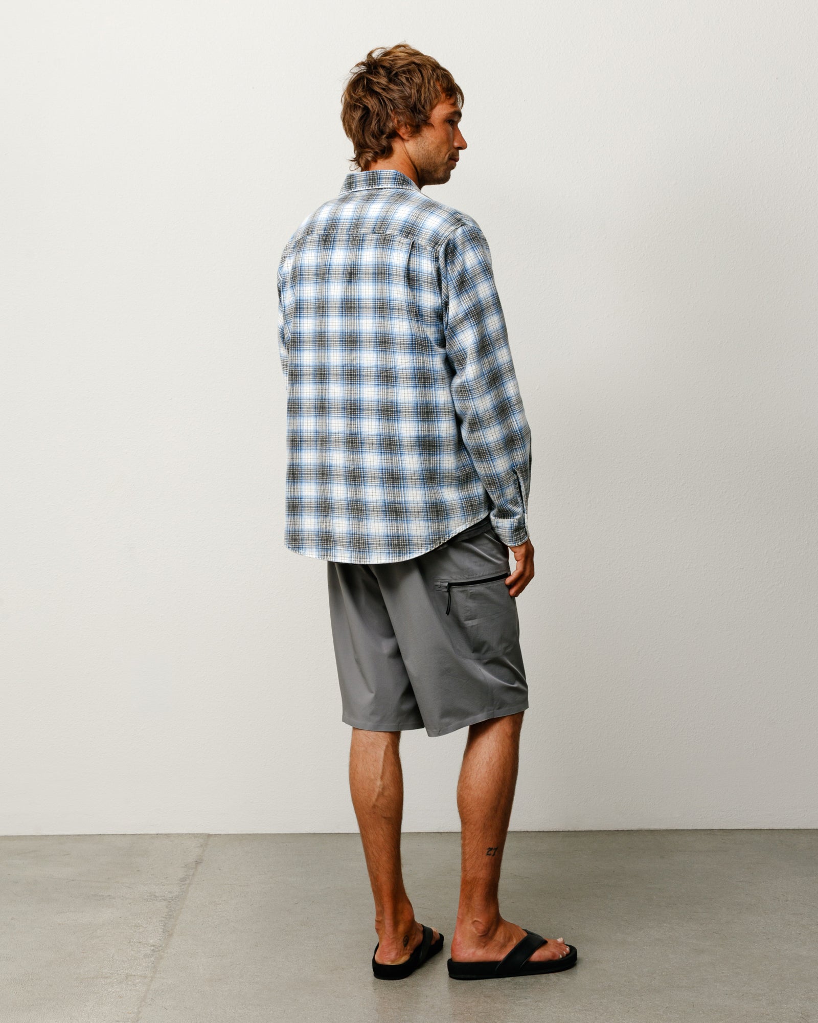 Peak Board Short unisex in grey, stretch nylon boardshorts with side zip pocket, rear view