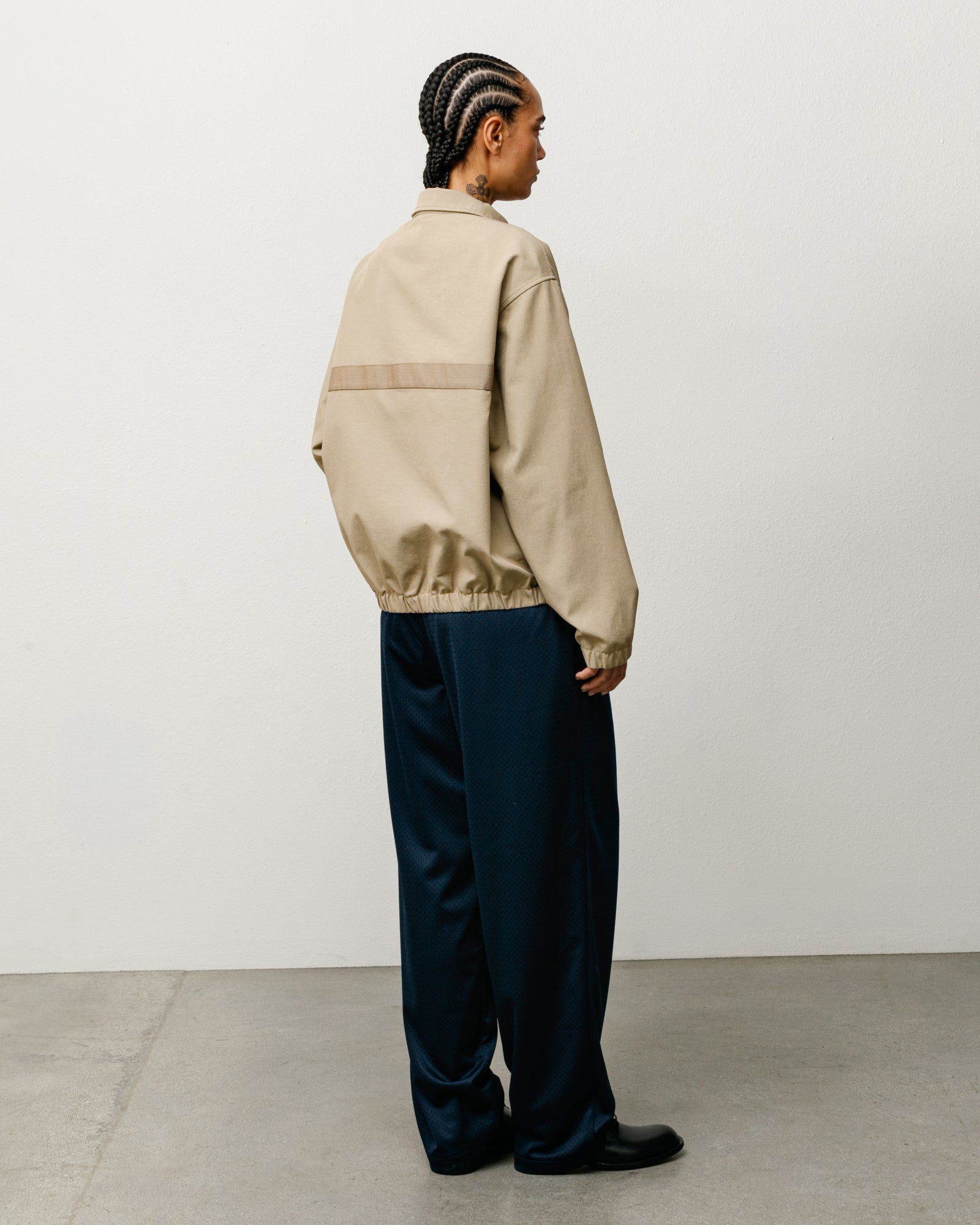 Mechanic Jacket in Khaki, back view with long sleeves and elastic hem detail