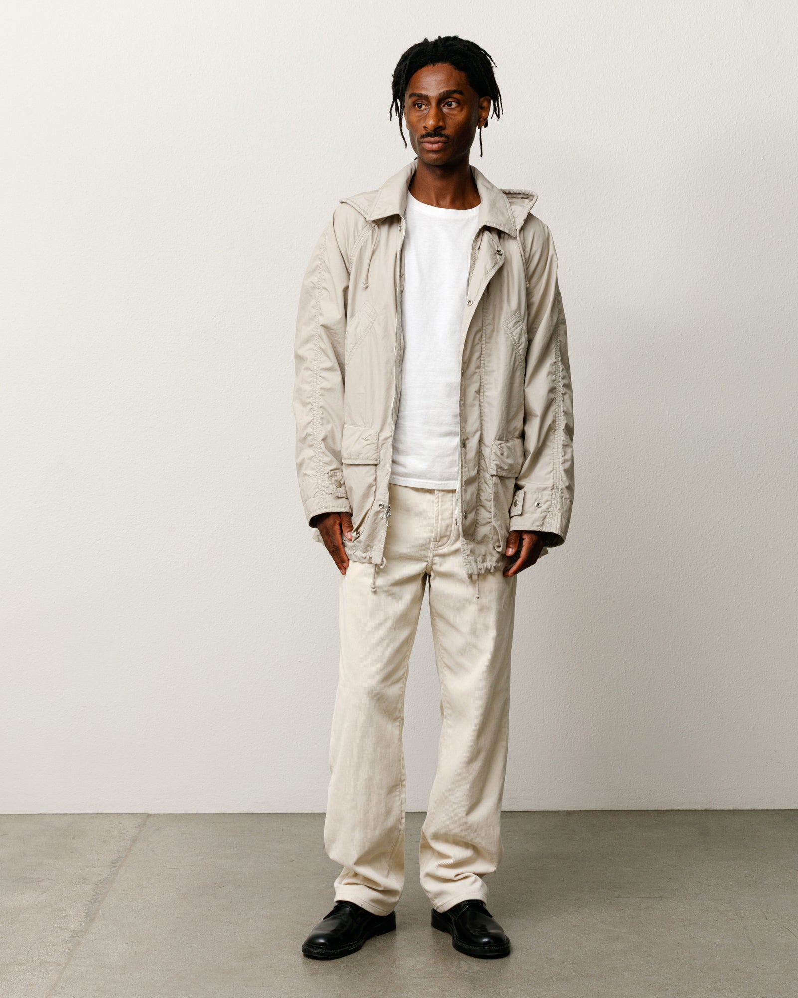 Lightweight Field Parka outerwear in Stone, relaxed fit washed cotton with removable hood.