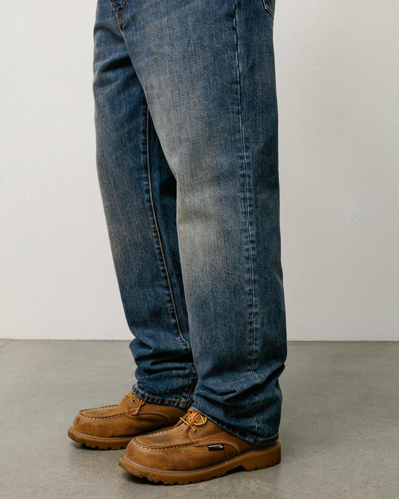 New Classic Jean Slub Jean in Blue, regular straight-fit denim shown on model with moc-toe boots.