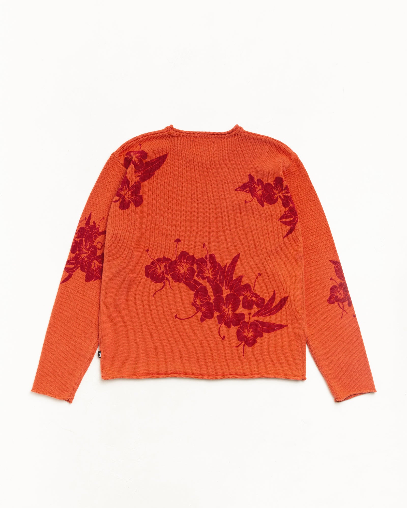 Floral Roll Neck Sweater in Rust, back flat lay with red floral jacquard knit and rolled edges.