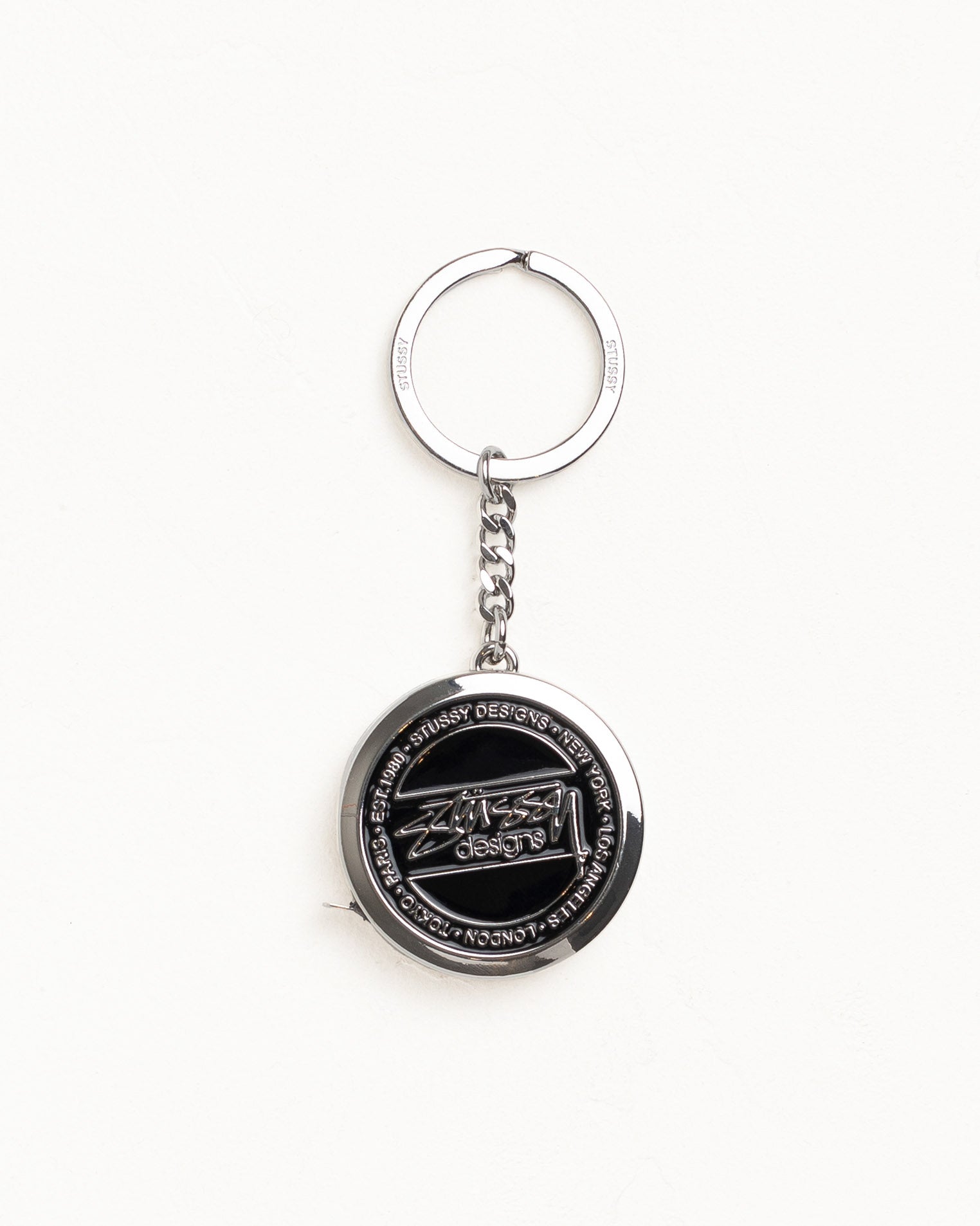 Measuring Tape Keychain Accessories in the color Black | hero:main:collection:new-arrivals,shirts,tops-shirts,all,tees,outerwear,denim,knits,accessories,sunglasses,hoodies,sweats,mens-hoodies-sweatshirts,shorts,pants,bottoms,crew-sweats,zip-ups,swim,sweatpants,graphics,lazy-tees,mens-swim,womens-swim,swim,basic-9twenty,button-ups,jerseys,thermals,shorts,trunks,cargos,denim-jeans,bottoms,bags,belts,wearables,gear,footwear,button-ups,basic-tops,jerseys, | product-card-slider