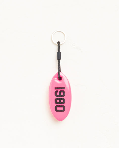Floatie Keychain in pink vinyl-coated foam with Stüssy logo and 1980 print