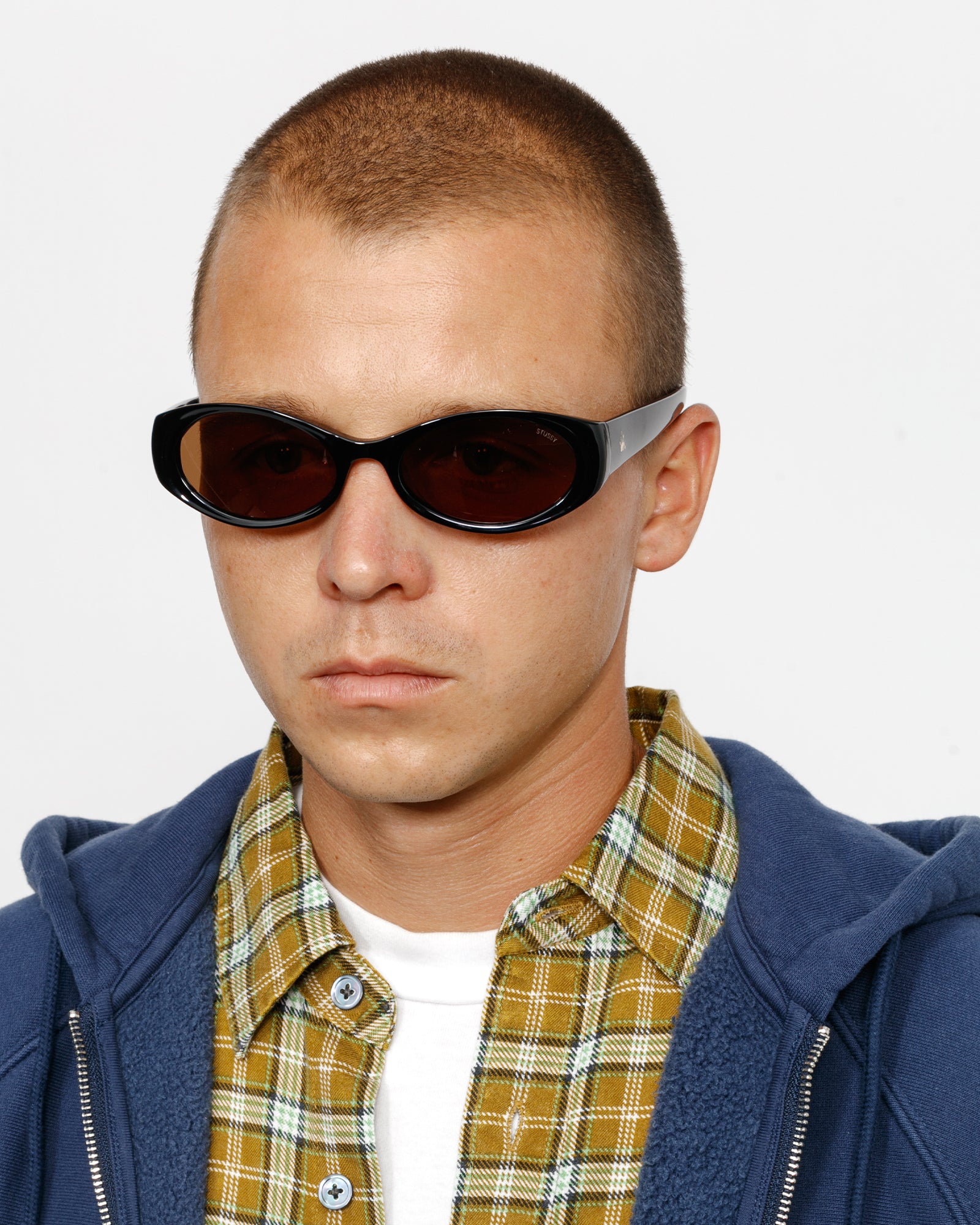 Tracy Sunglasses in black / dark amber – Stüssy