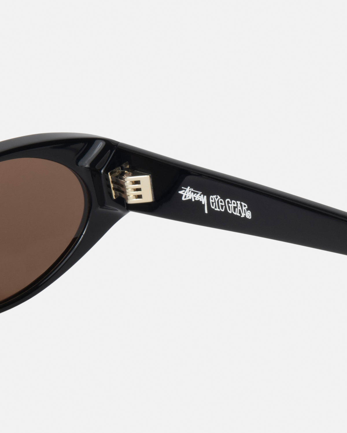 Tracy Sunglasses in black / dark amber – Stüssy