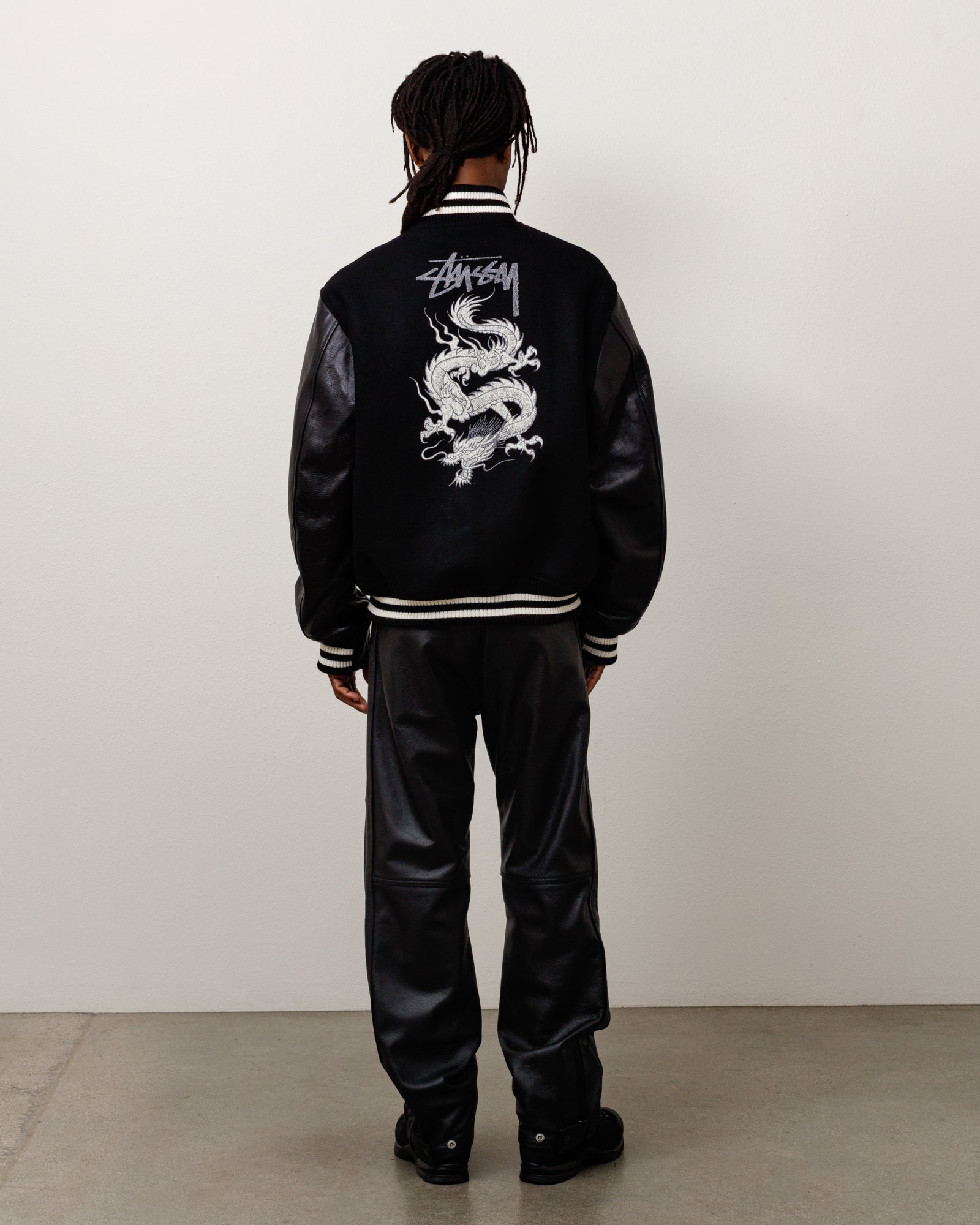 Junya Varsity Jacket – Black | Outerwear | Stüssy